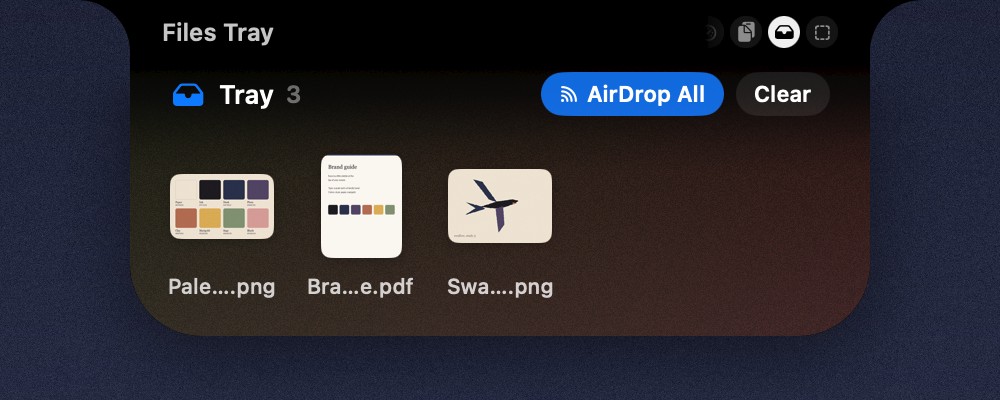 The file tray holding two images and a PDF, with the AirDrop All button